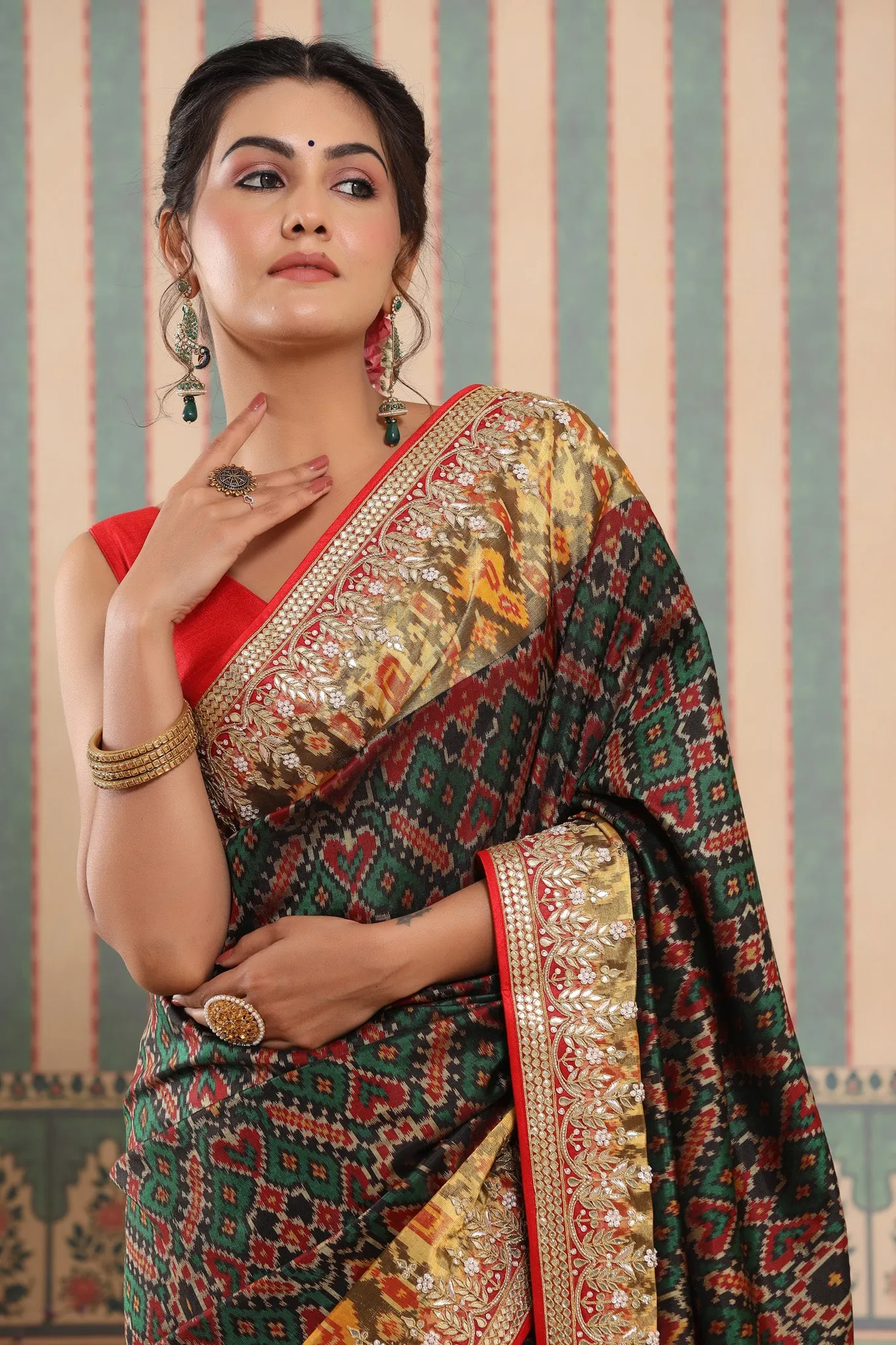 90Z594-RO Dark Green Patola Silk Sari with Embroidered Zari Border