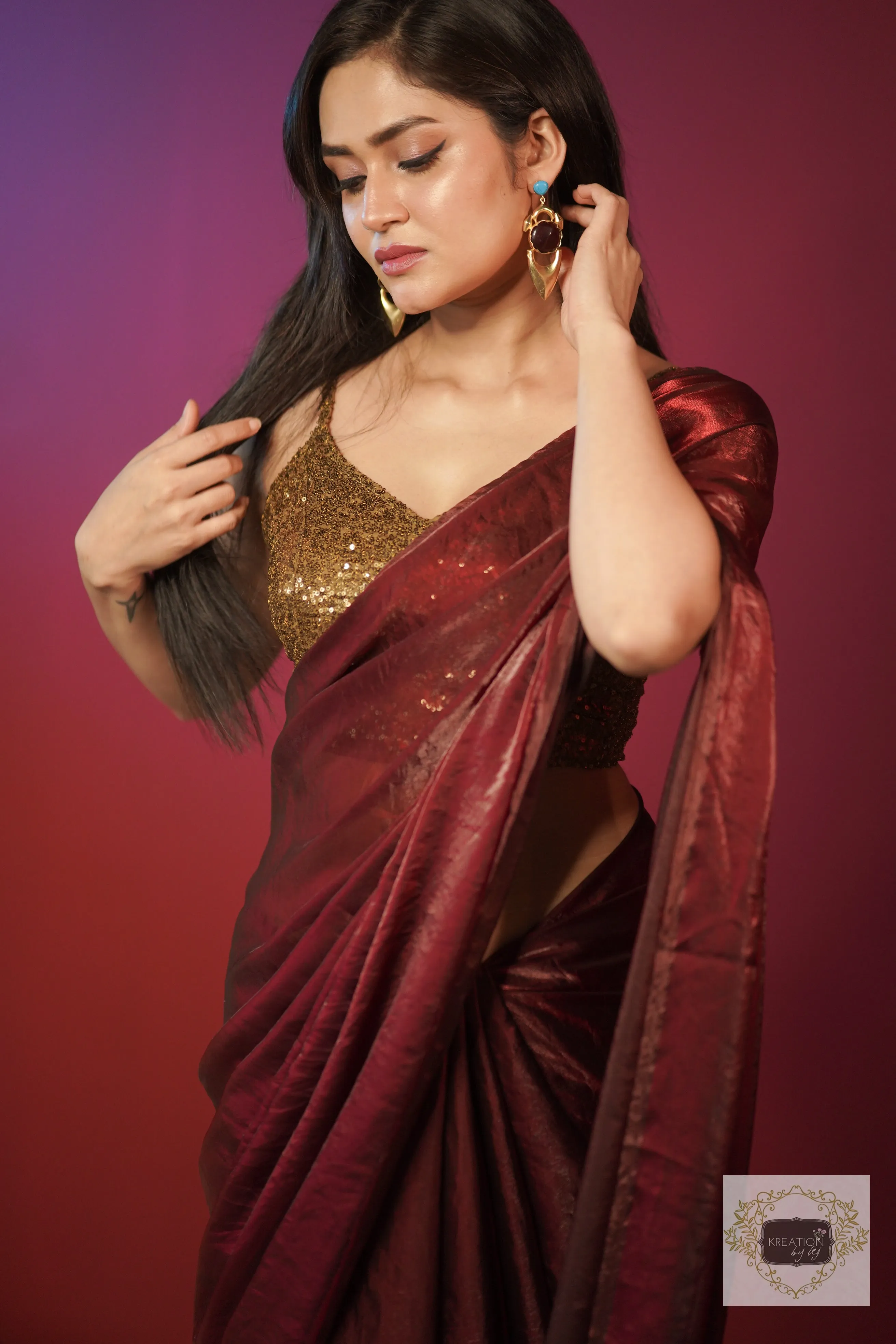 Cheery Wine Shimmer Satin Saree with Hand made Tassels on Pallu