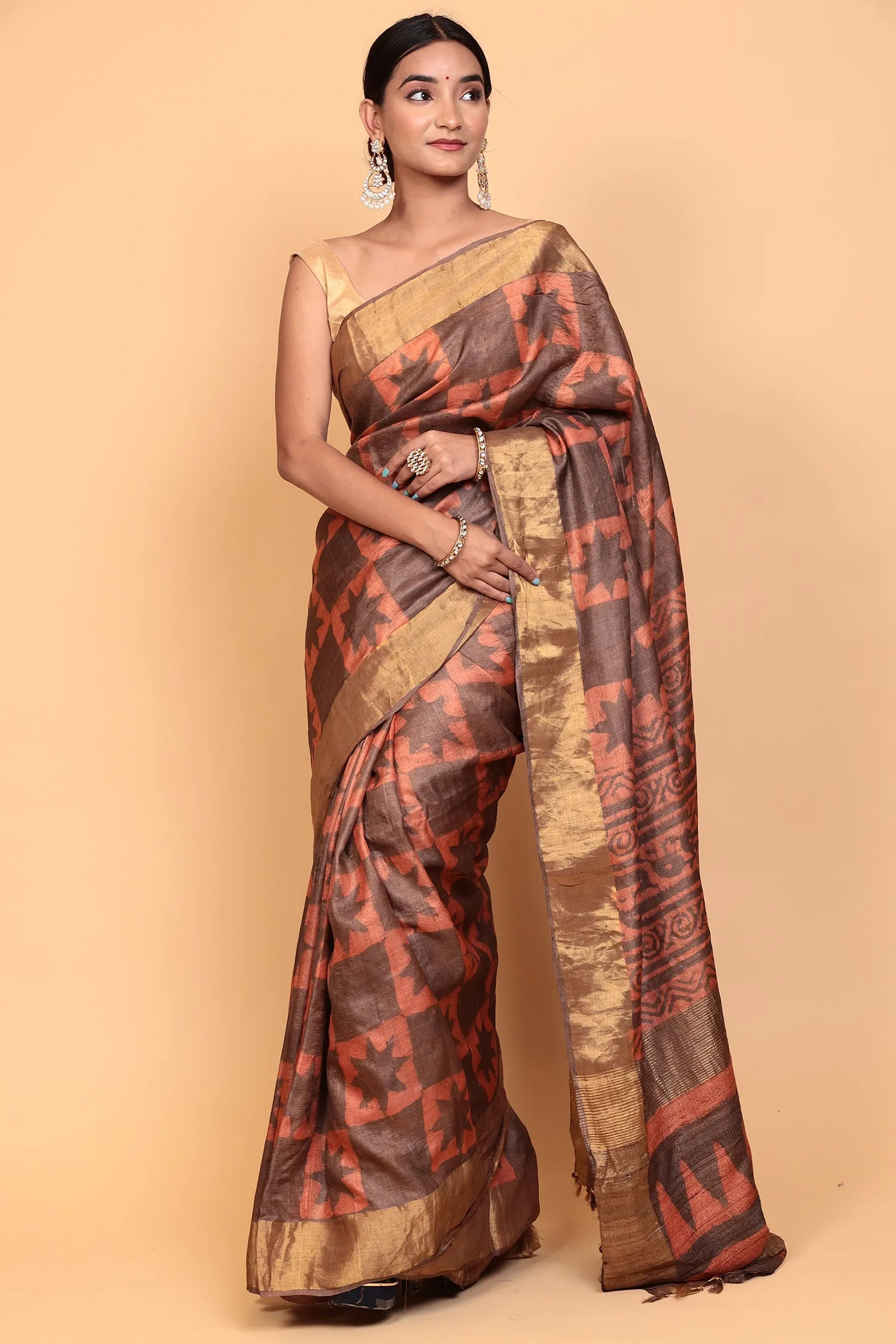 Dabu print Tussar silk Saree with Zari work.