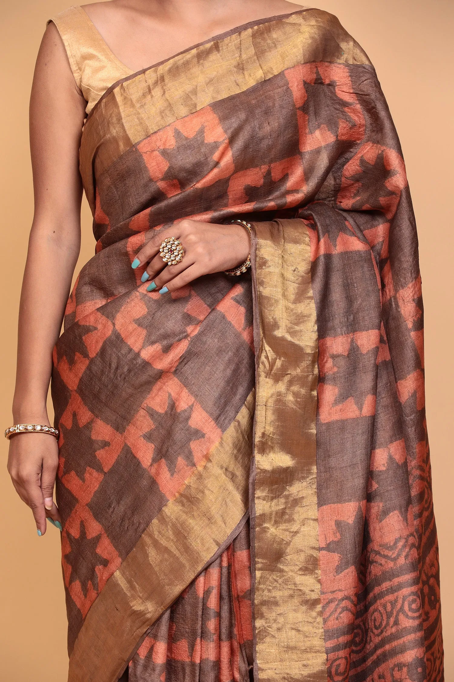 Dabu print Tussar silk Saree with Zari work.