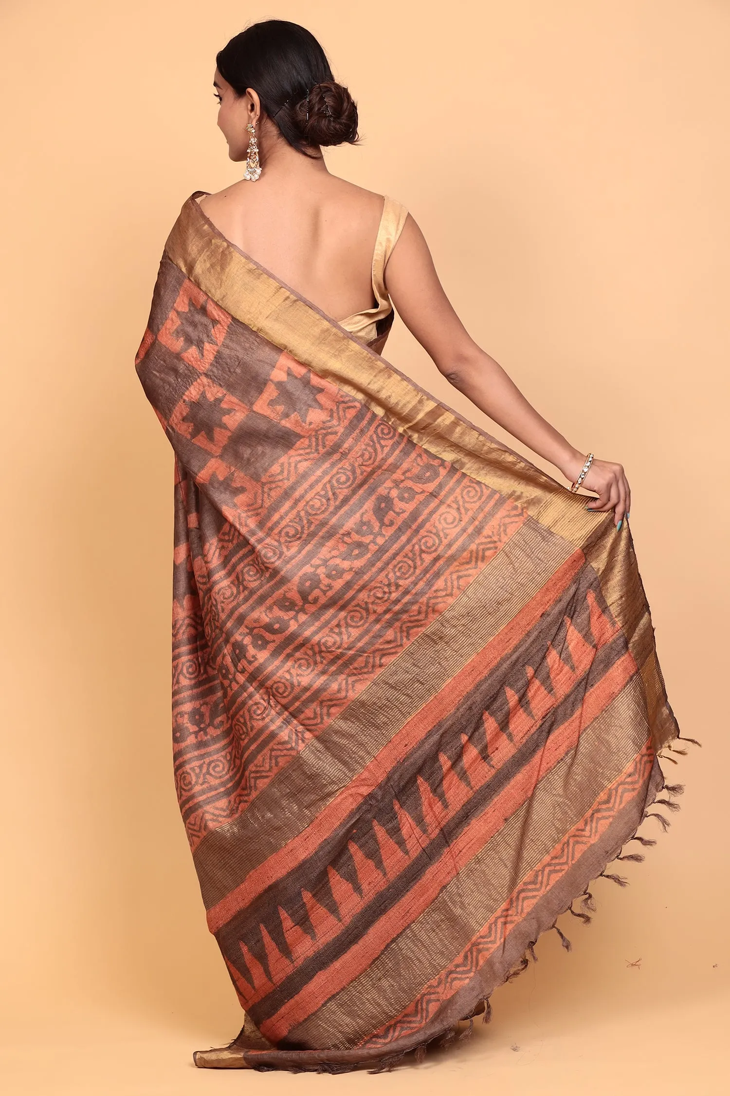 Dabu print Tussar silk Saree with Zari work.