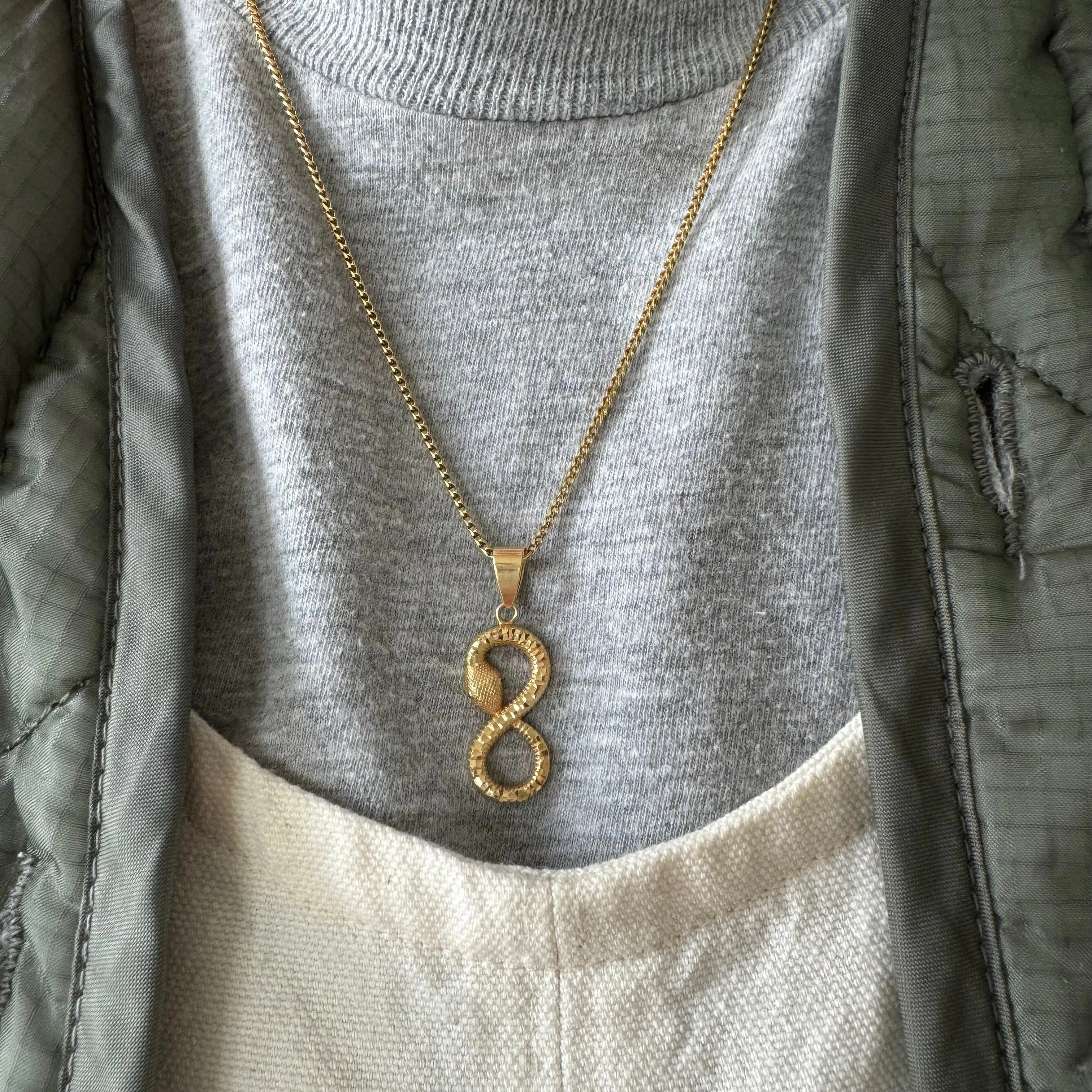 P R E - L O V E D // infinite ouroboros / 18k yellow gold serpent figure eight / a pendant