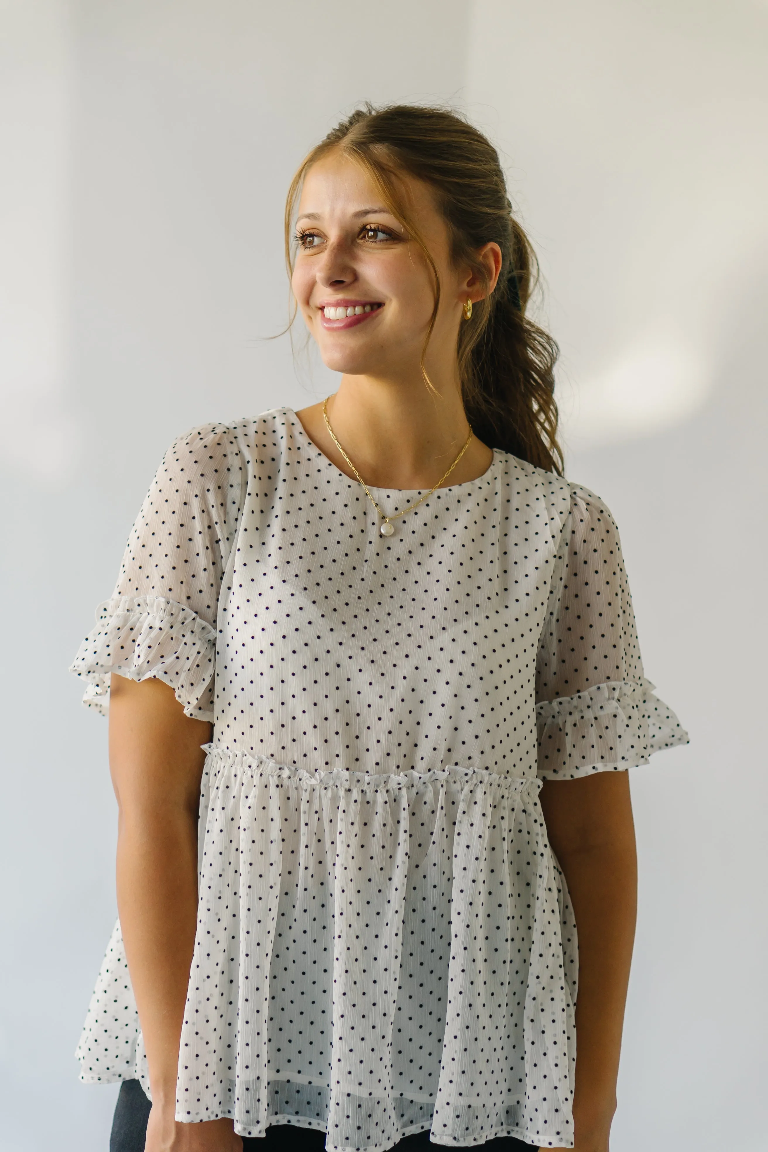 The Duran Polka Dot Peplum in Ivory